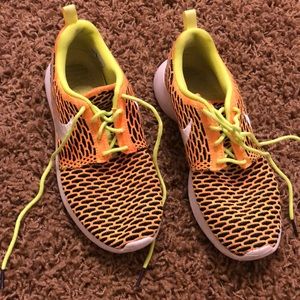 Lightly worn woman Nike tennis shoes